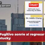 Fugitivo sonríe al regresar a Kentucky