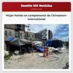 Mujer herida en campamento de Chinatown-International